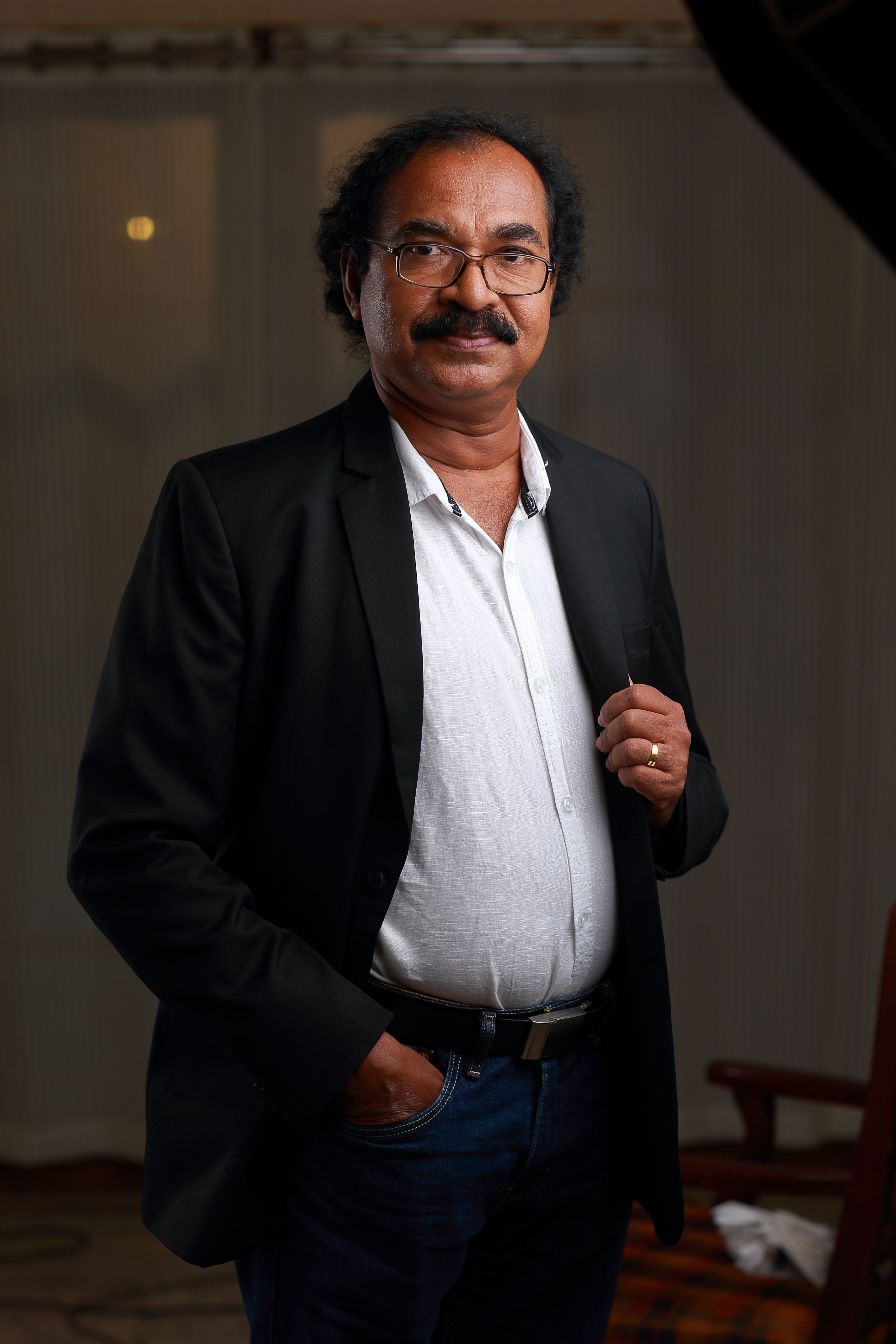 Dr. Nellikode Sreedharan